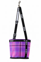 Kez Rugs nose feeder bag in purple check mesh, hanging by its KEZ strap and snap hook