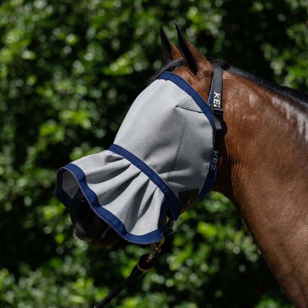 Grey Fly Mask on a bay horse